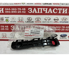 Кронштейн бампера переднего левый Toyota 52146-07030