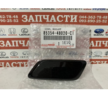 Крышка форсунки омывателя фары левой Toyota 85354-48020-C1